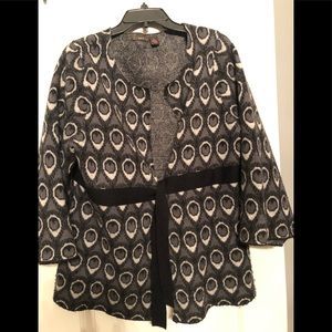 Tie front sweater with bell sleeves.